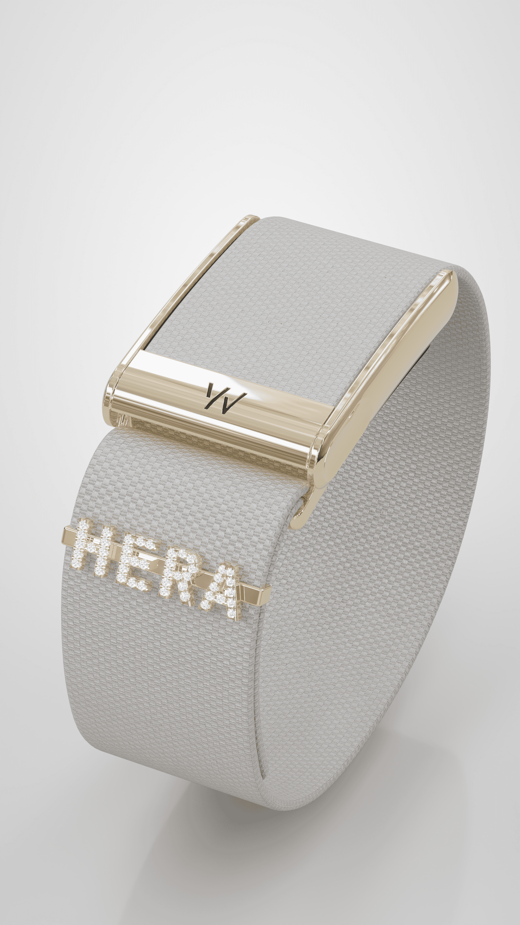 HERA Ivory cuff with ivory woven textile, polished gold hardware, and gem-set lettering